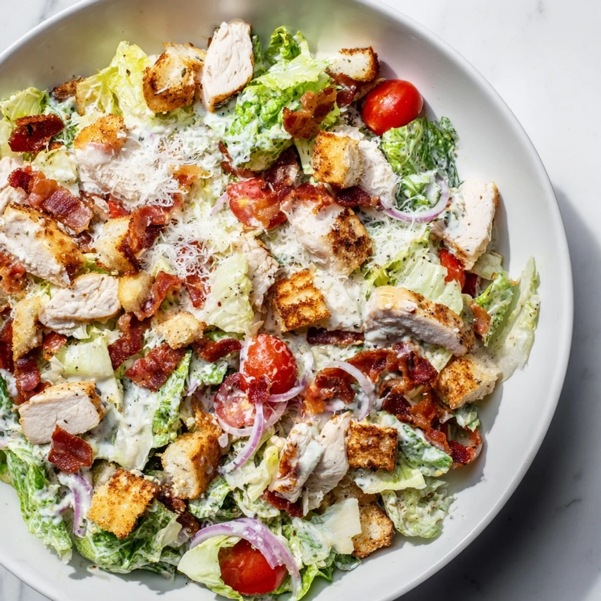 This image showcases a vibrant and delicious Costco Chicken Bake Salad Bowl, ready to be enjoyed.