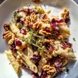 Festive Baked Brie & Cranberry Pasta: imagine the rich flavors and textures of this comforting, vegetarian dish.