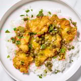 Warm Express Chicken Piccata Rice Bowl, steaming with fluffy rice beneath a creamy, flavorful piccata sauce.