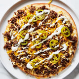 Golden crust topped with melted cheese, spicy jalapeños, and ground beef makes this Taco Pizza delicious.