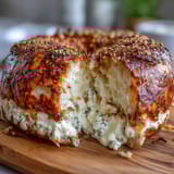 Chewy cottage cheese bagels topped with everything bagel seasoning, served fresh and warm from the oven.  