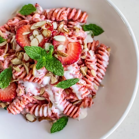 Sweet Strawberry Yogurt Pasta, a colorful summer dessert, featuring fresh strawberry sauce and creamy yogurt.
