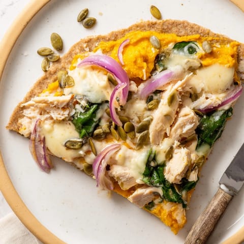 Homemade Protein Pumpkin Ricotta Pizza recipe: a healthy, cheesy slice on whole wheat.