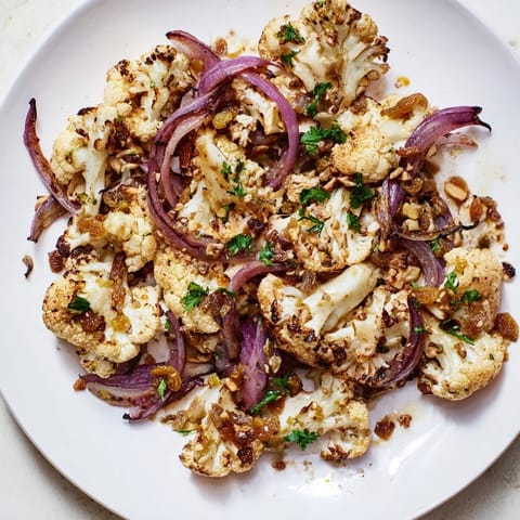 Bright and refreshing Mediterranean-style Warm Roasted Cauliflower salad, a vegetarian delight.