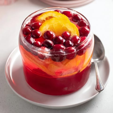 A vibrant holiday punch, a refreshing mix of cranberry and orange juices, ready to serve!