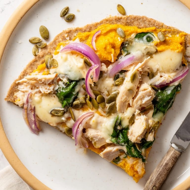Homemade Protein Pumpkin Ricotta Pizza recipe: a healthy, cheesy slice on whole wheat.