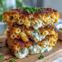 Soul Food Baked Mac and Cheese with Crunchy Top, a creamy, cheesy casserole topped with a golden, crispy breadcrumb layer.